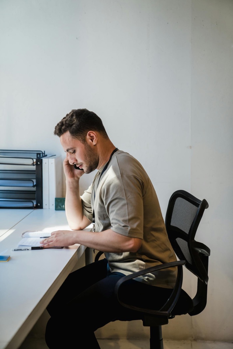 Business phone call in a small office